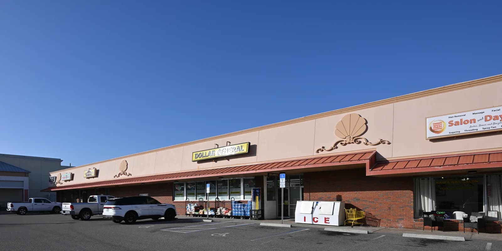 Dollar General storefront and neighboring businesses at Indialantic Center in Florida